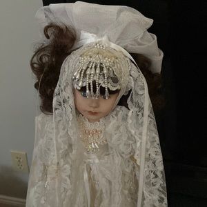Limited edition and numbered.    Porcelain Victorian Collector’s doll